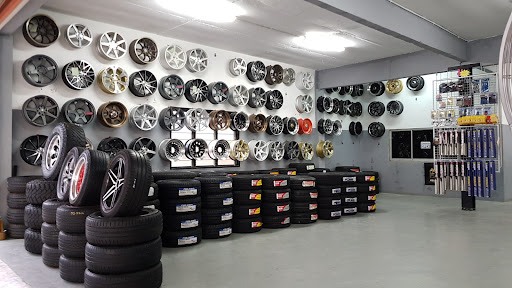 AD TYRES & BATTERIES